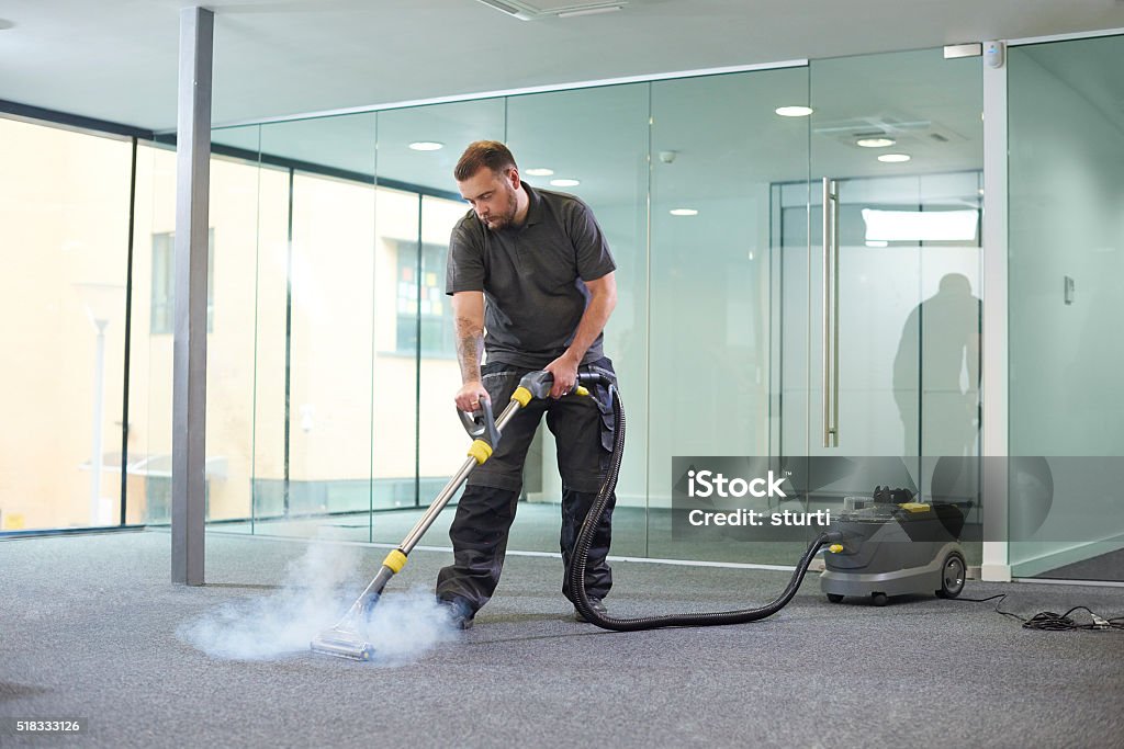 Hand-knotted wool rug being professionally cleaned